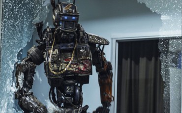 Still of Sharlto Copley in Chappie (2015)